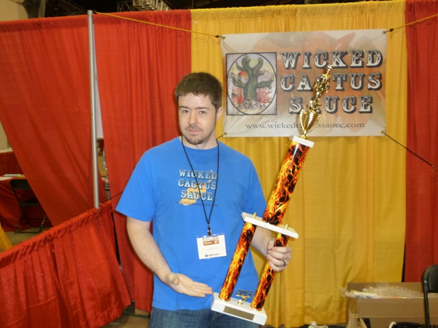 Mike from Wicked Cactus holds his Feast Your Eyes on This trophy